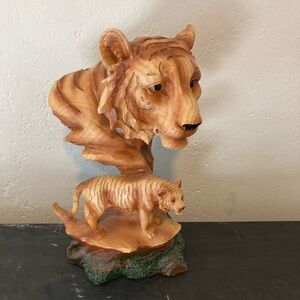 Resin lion with child